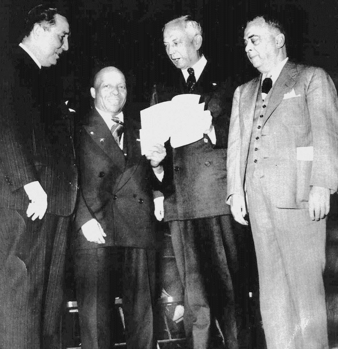Left to right - Pennsylvania Senator Meyers , FATHER DIVINE, <br />Governor of Pennsylvania Edward Martin,
  Mayor Samuels of Philadelphia.