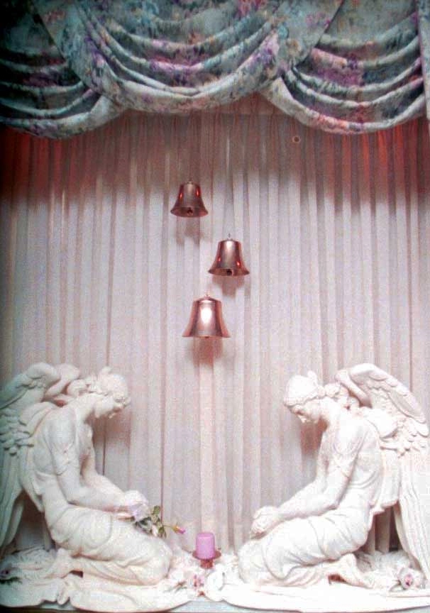 The Angels behind the Head of the Holy Communion Table at the Divine Tracy  Hotel