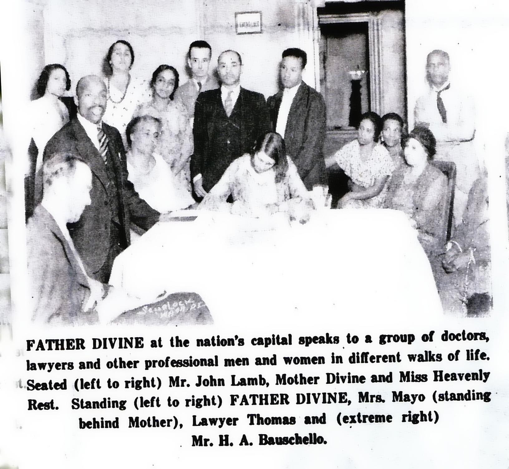 FATHER DIVINE
with a group in Washington, D. C.
