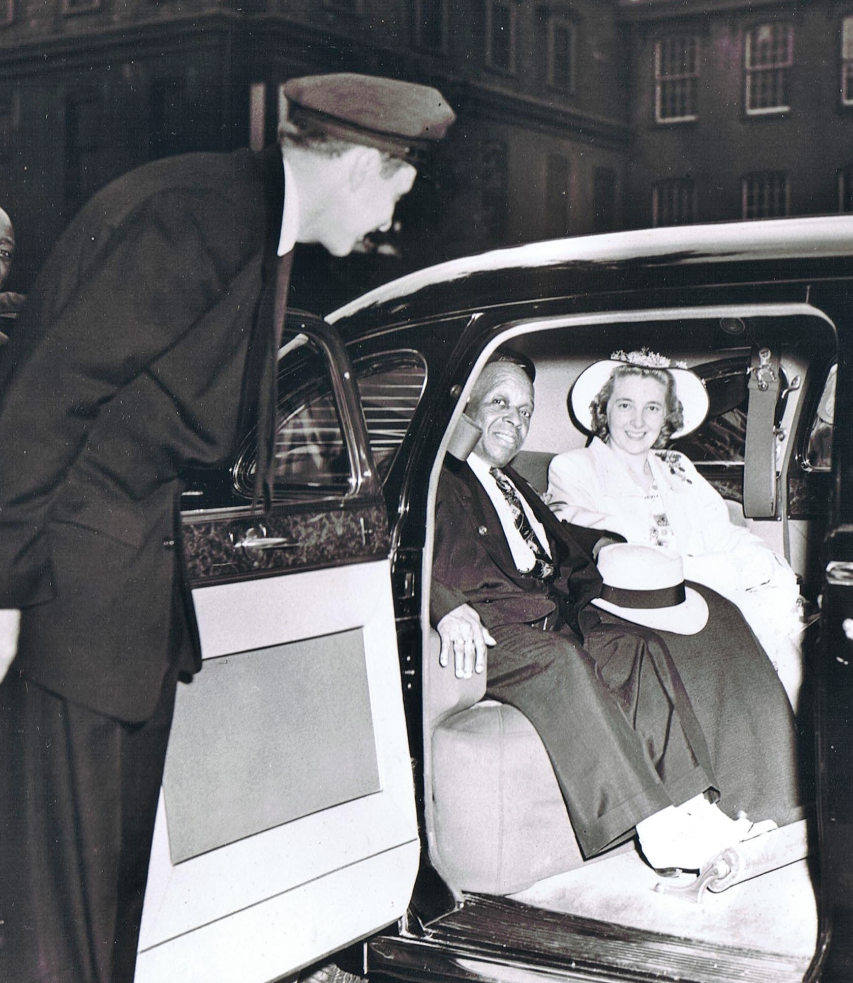 FATHER DIVINE and MOTHER DIVINE in the limo.