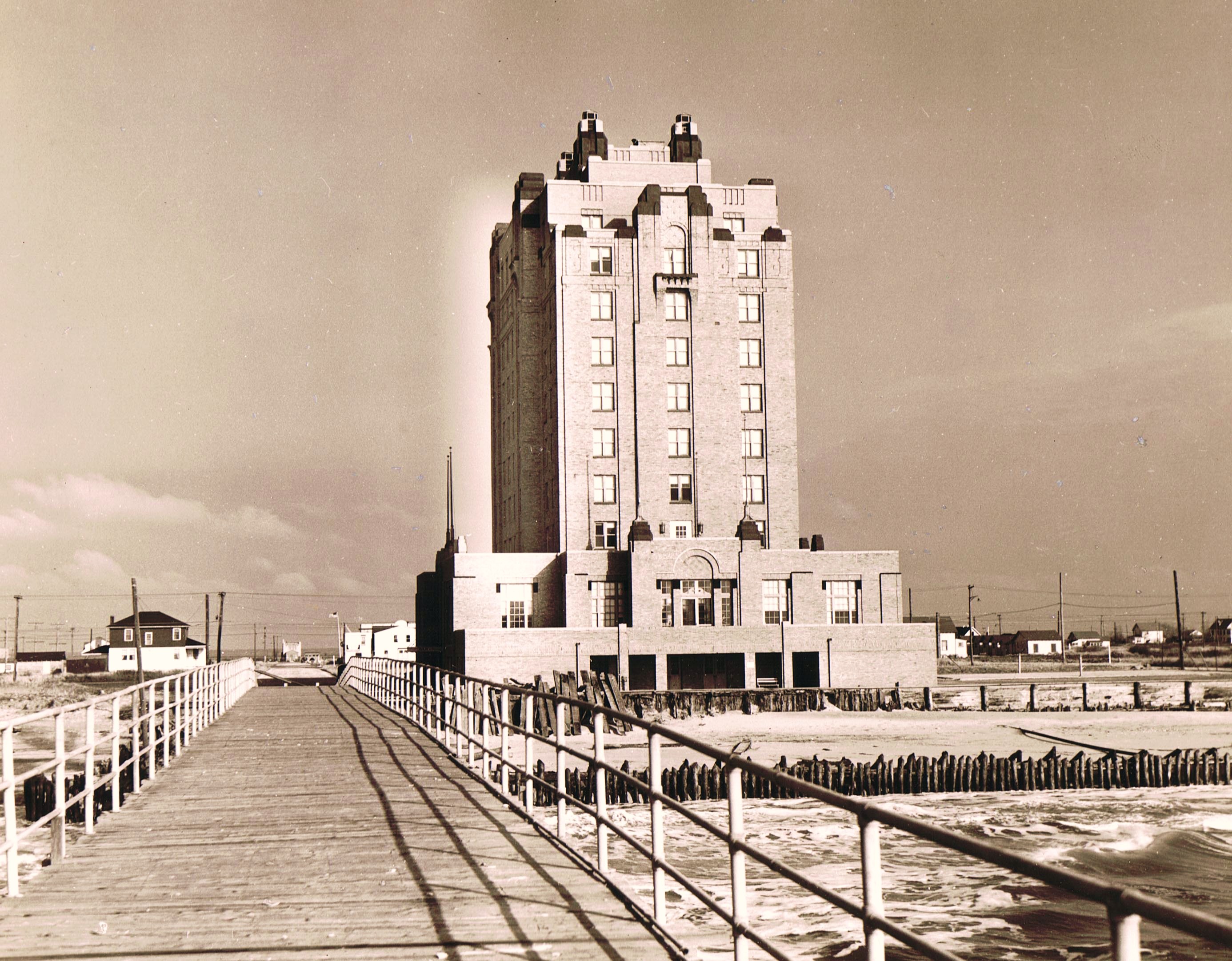 The Brigantine Hoteltaken fron the Boardwalk leading to the Pier building, 1930s