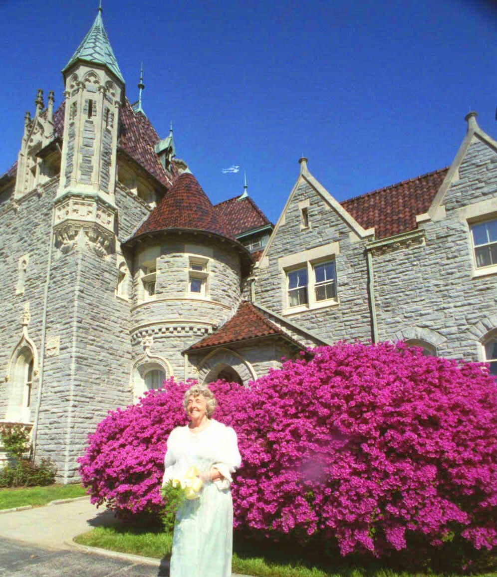 MOTHER DIVINE in front of the Manor House.